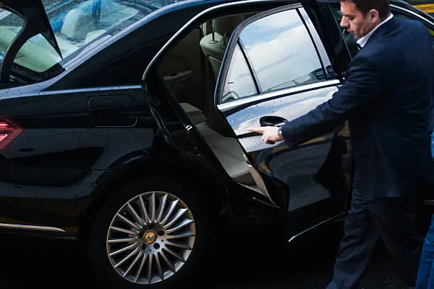chauffeur open for passenger who reserve limo service